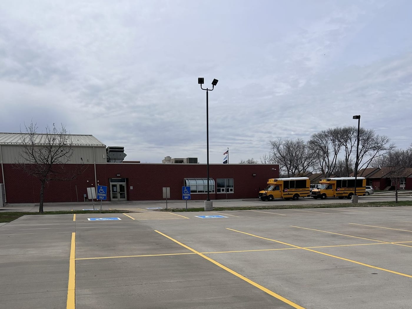 Yellow curb and stall lines at a school lot